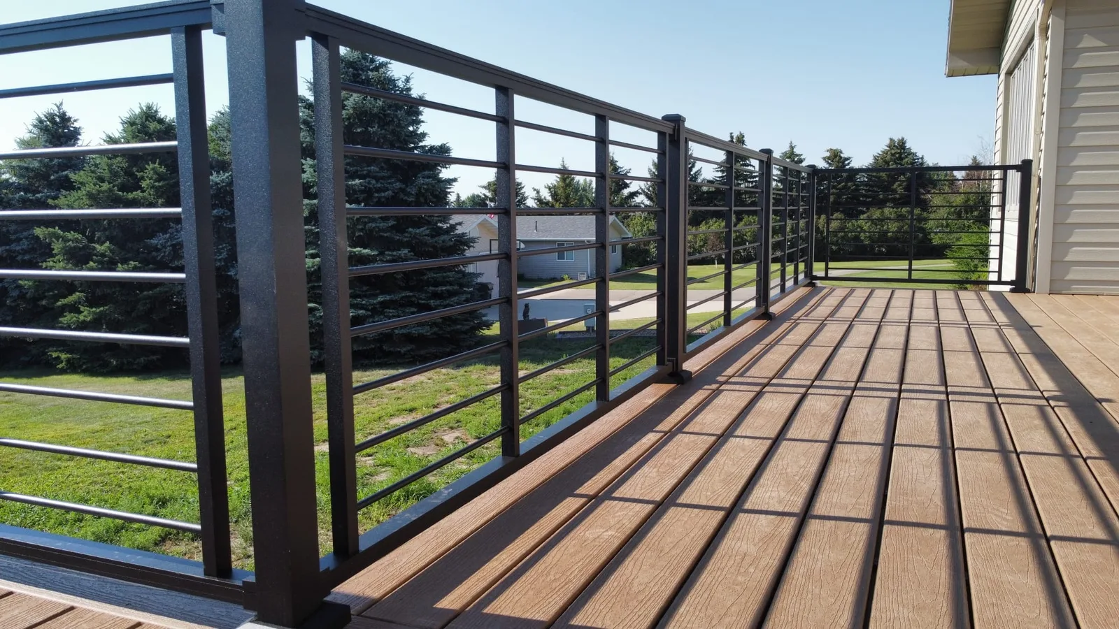 Composite Deck with Metal Railing in Watford City, ND