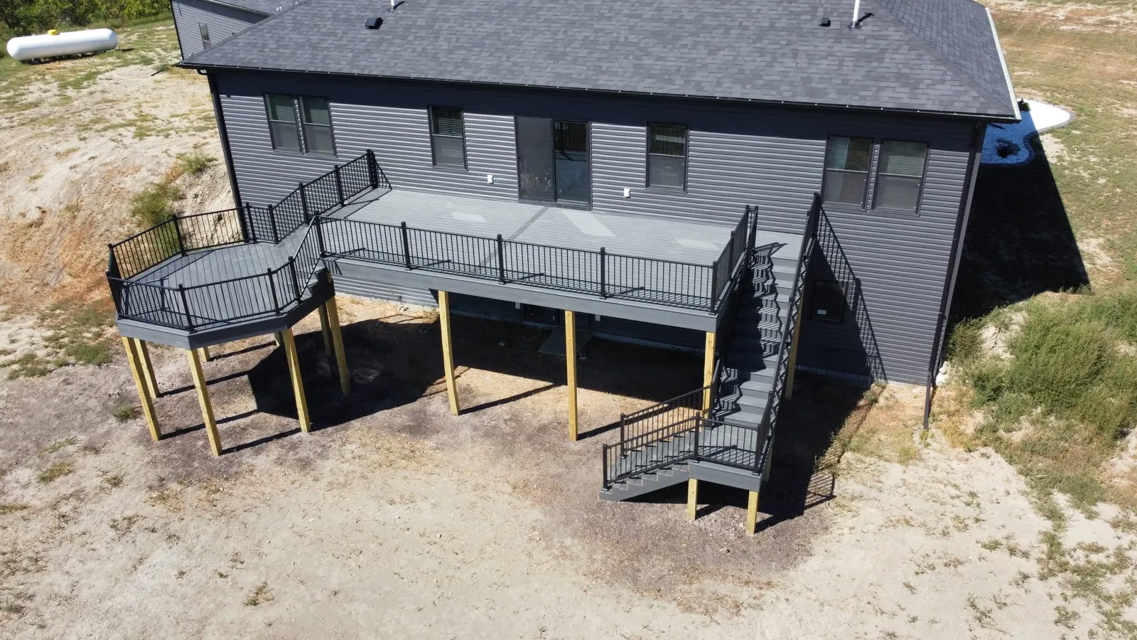 Raised Composite Deck with Stairs in Stanley, ND