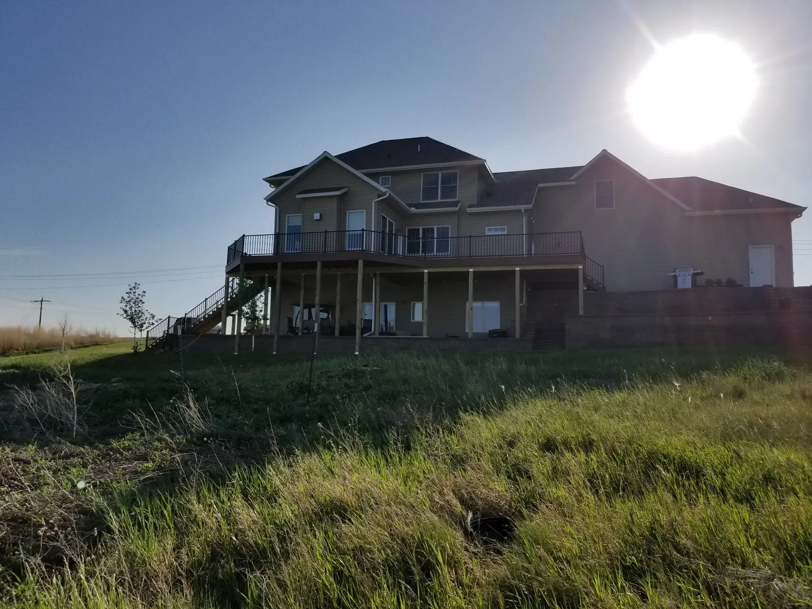 Two-Story Home with Wraparound Deck in Alexander, ND